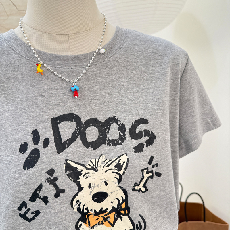 韓国の新しい夏スタイルのかわいい子犬の漫画プリント半袖Tシャツ、フェミニンでスリムなラウンドネック、多用途のトップス|undefined