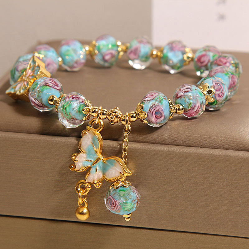 Nueva pulsera de vidrio azul de jardín de rosas de estilo chino para mujer, pulsera colgante de mariposa de lujo ligero de nicho, joyería de alta calidad