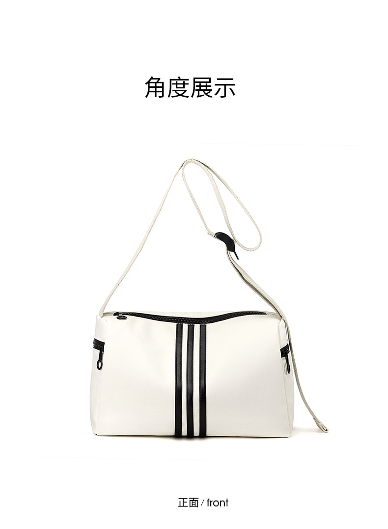 This is a simple, fashionable, casual and versatile crossbody bag for women, suitable for commuting. It is a large-capacity striped single-shoulder bag for both men and women undefined