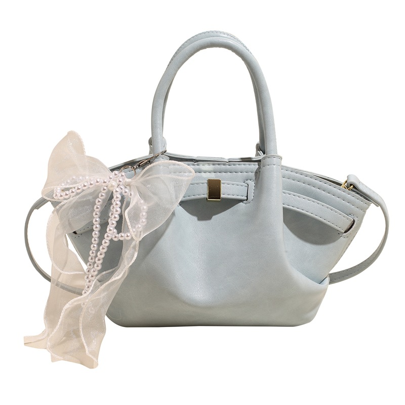 Nicho Zhong bolso de pulsera de brazalete para mujeres 2025, nuevo tipo de mochila de viaje, diseño de tendencia, bolso de cubo de alta calidad