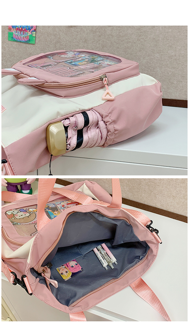 The new cute cartoon printed student bag with a large capacity and transparent student storage single-shoulder bag is selling well for women undefined