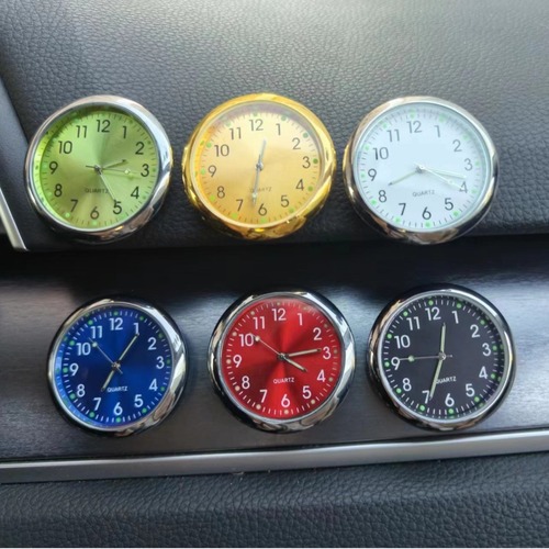 Supply glow-in-the-dark sun pattern car-mounted clock adhesive car clock quartz car clock