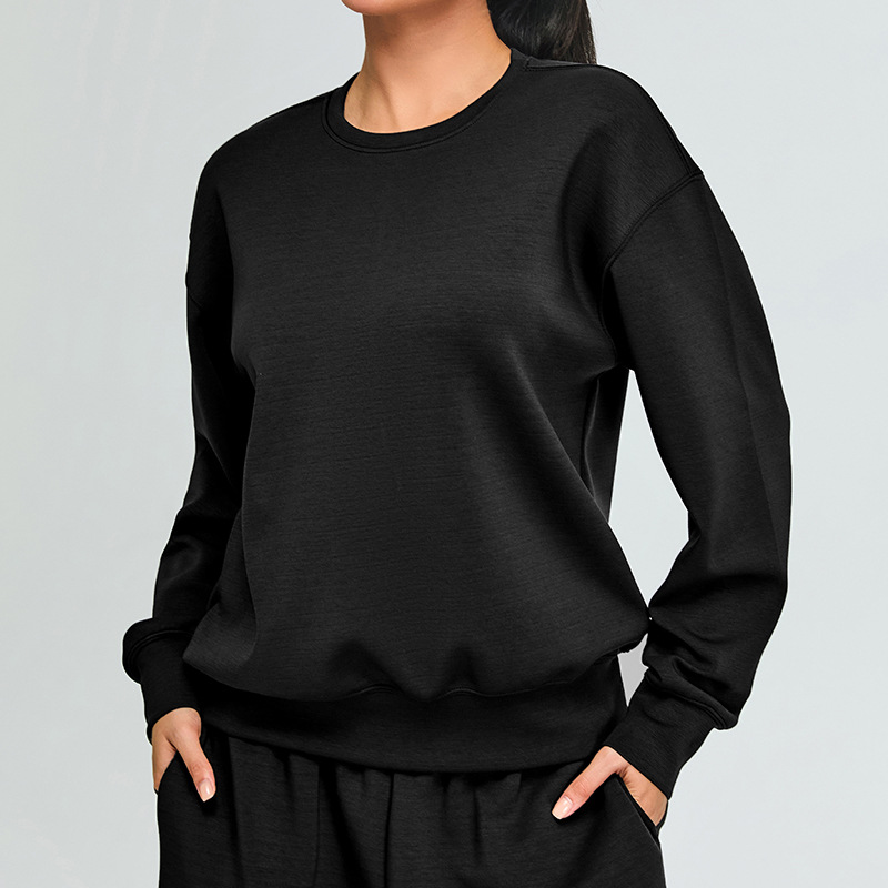 Otoño e invierno nuevo estilo modal suéter deportivo ropa de fitness top mujer al aire libre suelta casual adelgazante ropa de yoga de manga larga