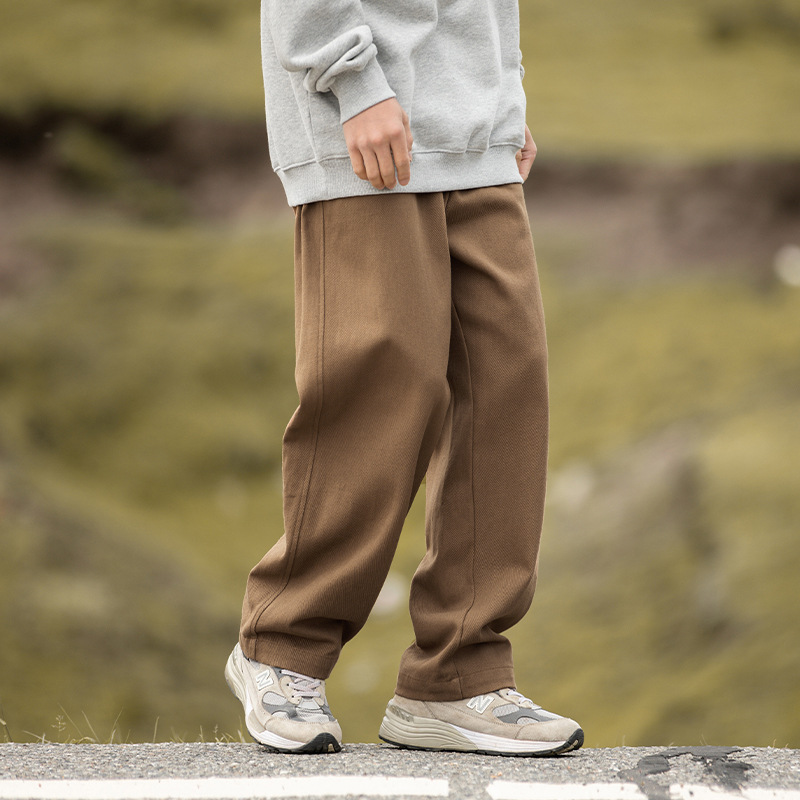 Pantalones casuales sueltos rectos de microperfil para hombre 2025 primavera nuevo estilo montaña pantalones retro de sarga de textura de algodón puro de todo fósforo