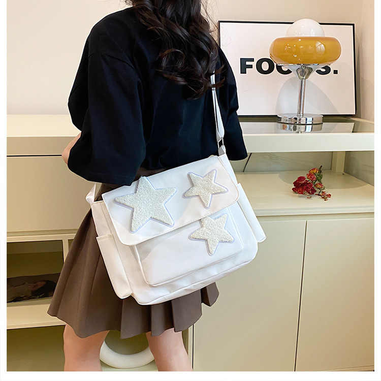 Cross-border wholesale large-capacity five-pointed star canvas single-shoulder bag, cute school style crossbody bag, student commuting bag for classes undefined