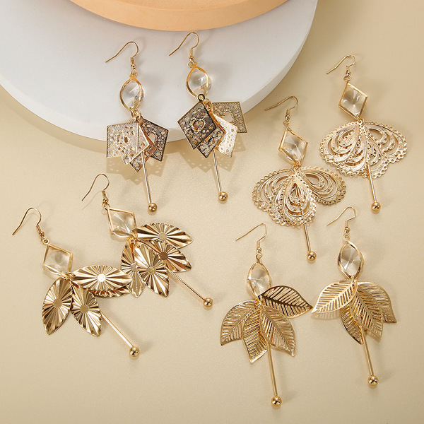 fashionable golden geometric earrings with tassels