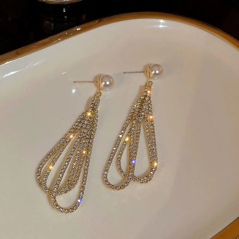 De gama alta de diamantes largos pendientes de la borla de la aguja de plata pura pendientes de perlas de moda elegante diseño temperamento pendientes