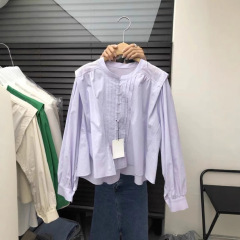 2025春の新作の純色の気質はゆったりしていて、やせています。丸首の長袖の上着のシャツの女性です。