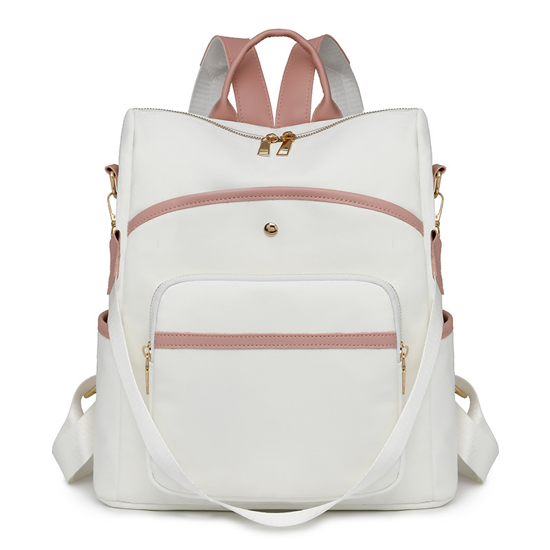 Mochila para mujer Mochila multiusos simple de gran capacidad Color sólido Moda ligera Bolsa de cuero de viaje al por mayor