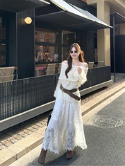 法式时尚套装女秋季2025新款一字领长袖毛衣流苏显瘦半身裙两件套