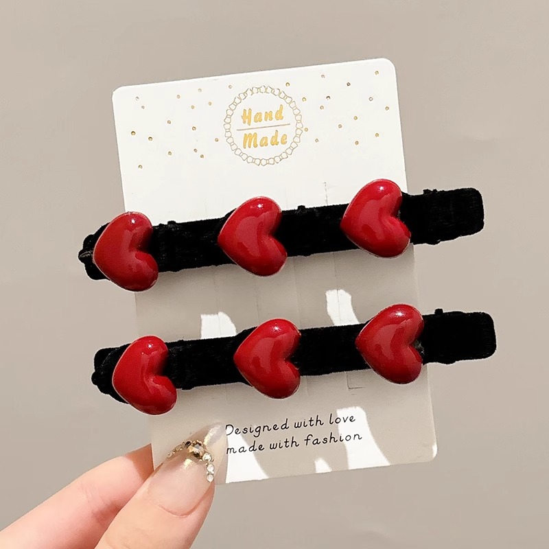 Niños de Año Nuevo acabado de cabello roto artefacto de otoño y invierno flocado rojo amor trenzado clip de cabello para mujeres flanqueado clip