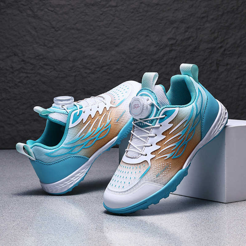 La nueva temporada escolar de primavera promueve principalmente zapatos de fútbol para hombres y mujeres para juegos de uñas para niños 30-39 yardas zapatos deportivos con botones giratorios