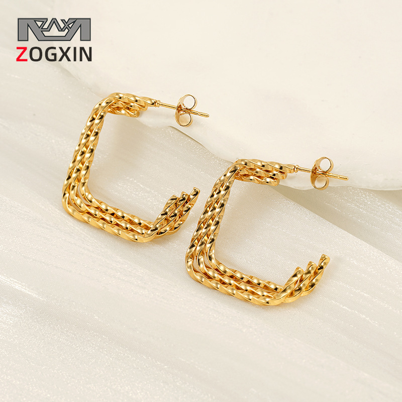 Pendientes torsos de acero inoxidable estilo americano europeo y americano Diseño de nicho de moda Pendientes de acero de titanio femenino de todo fósforo de nuevo estilo de 18K