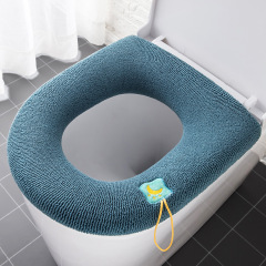 トイレのクッションを厚くして、家庭用の水洗い可能な便器の輪の漫画の取っ手の便器のクッションの四季通用の腰掛けをします。