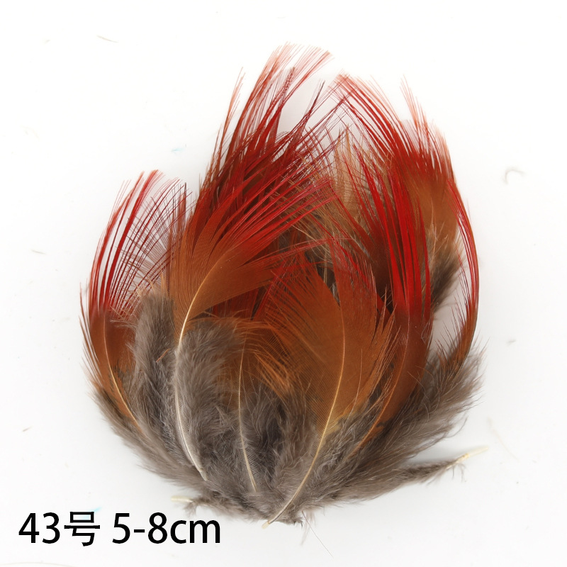 Fábrica al por mayor de bricolaje plumas pequeñas plumas naturales plumas de pollo salvaje plumas de pato jardín de infantes joyas hechas a mano gato divertido material de captura de sueños