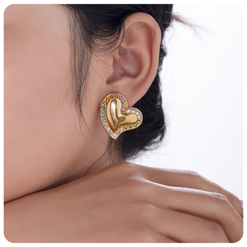 Taina europa peones de corazón de melón acero de titanio chapado 18k oro real diamantes aretes de moda para mujeres joyerías de lujo al por mayor