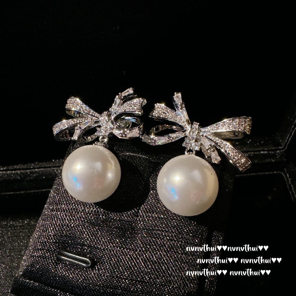 Artificial earrings with bow with zircon, french style