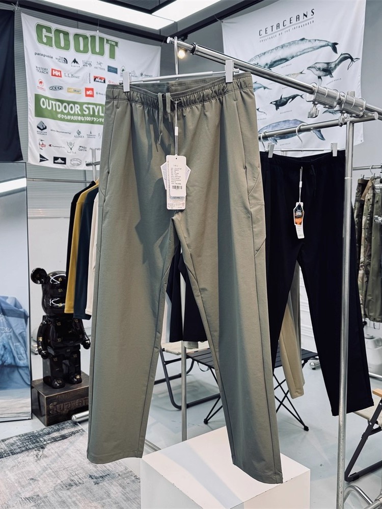 Pantalones al aire libre de cáscara blanda para hombres y mujeres pantalones de otoño impermeables al desgaste pantalones de montaña pantalones deportivos casuales