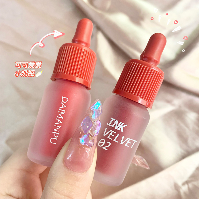 小さな哺乳瓶の唇釉薬のつや消しの霧の顔のネットの赤い同項の大衆は白い口紅の学生の金が色を落とさないでコップの現物をつけません。|undefined