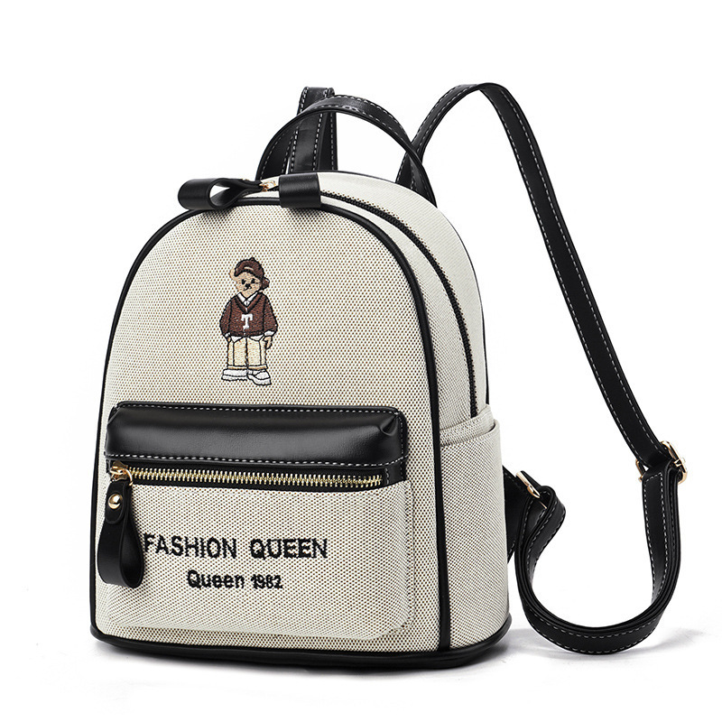 Mochila mujer 2025 nuevo estilo estudiante universitaria moda bordado mochila de viaje mochila de gran capacidad de doble uso