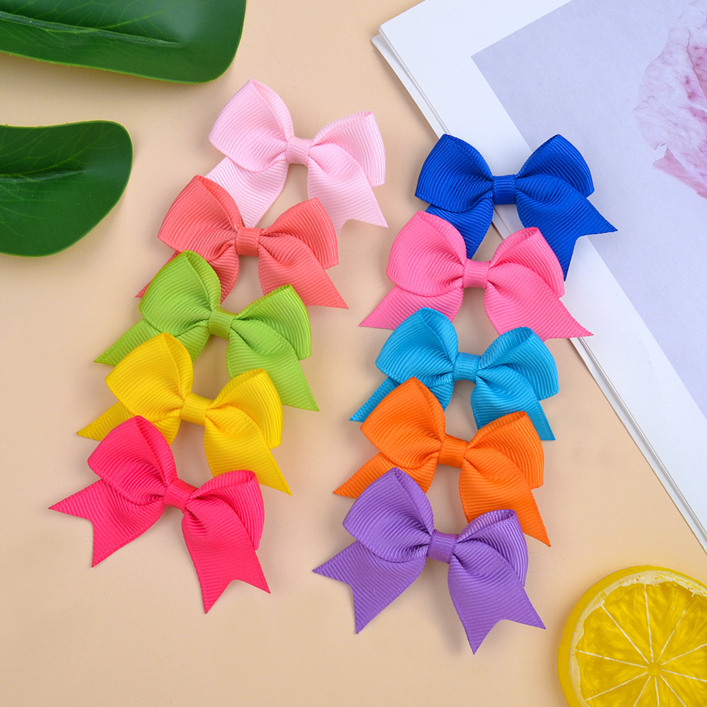 Nihaojewelry Simple Pure Color Children's Bow Hairpin Wholesale Jewelry display picture 4