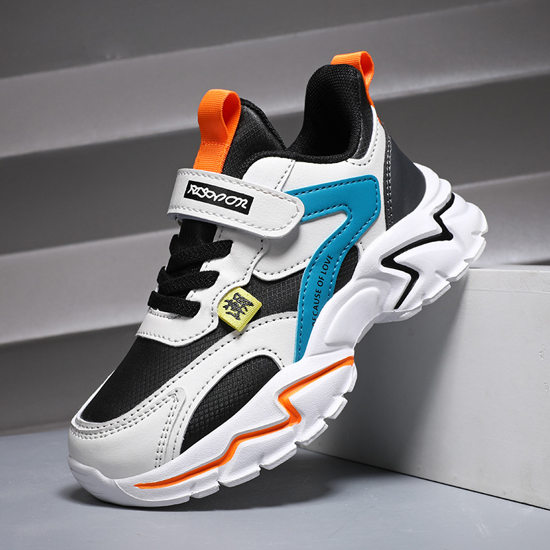 Zapatos para niños 2026 primavera nueva malla transpirable para niños con suela suave ligera para estudiantes de primaria para correr zapatos deportivos para niños
