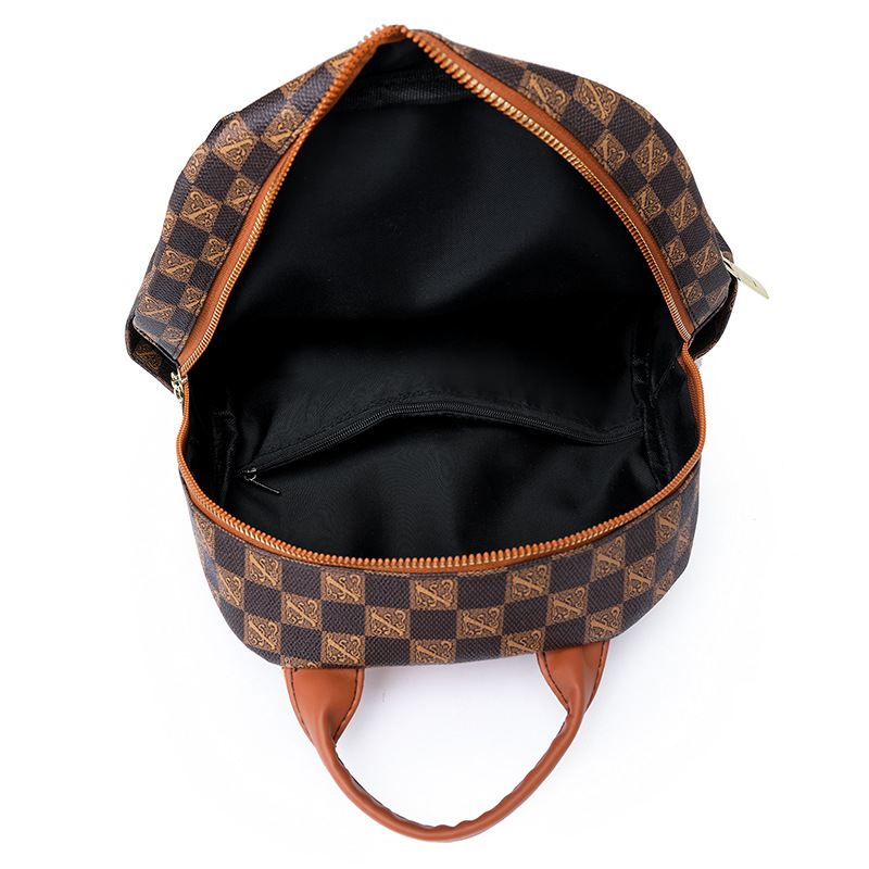 Spot al por mayor 2023 invierno nuevas señoras retro PU mochila de viaje de color de contraste de moda mochila escolar