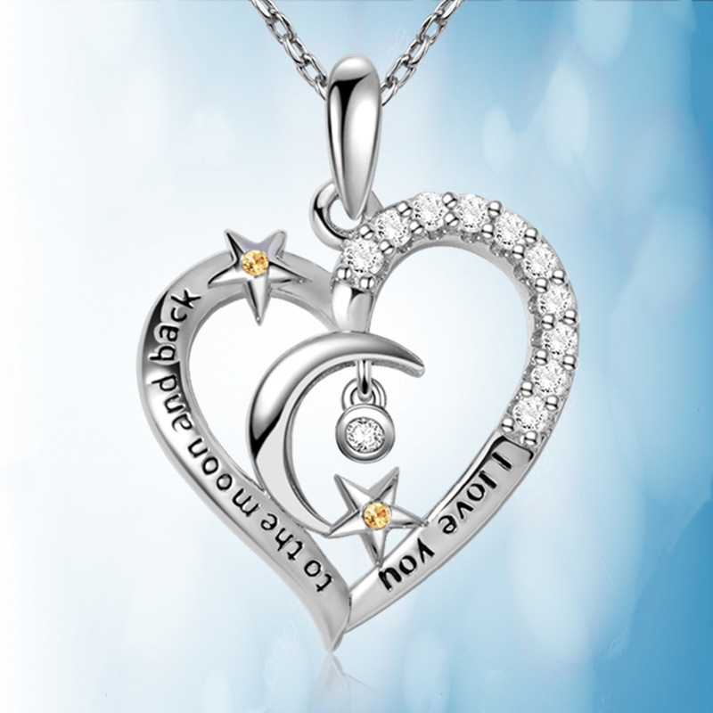 Collana con pendente a forma di cuore stella e luna gioielli donna_voghion.com