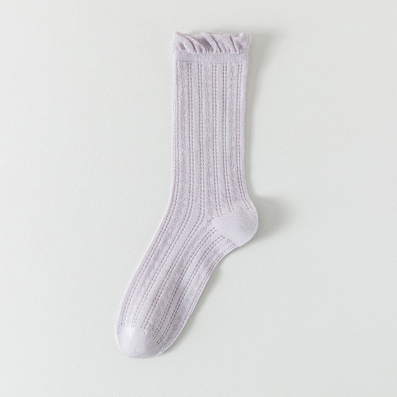 Calcetines de tubo medio Calcetines de algodón de color sólido para mujer delgada de verano Calcetines de confinamiento deshuesados Calcetines de pila de malla Calcetines de mujer Zhuji al por mayor