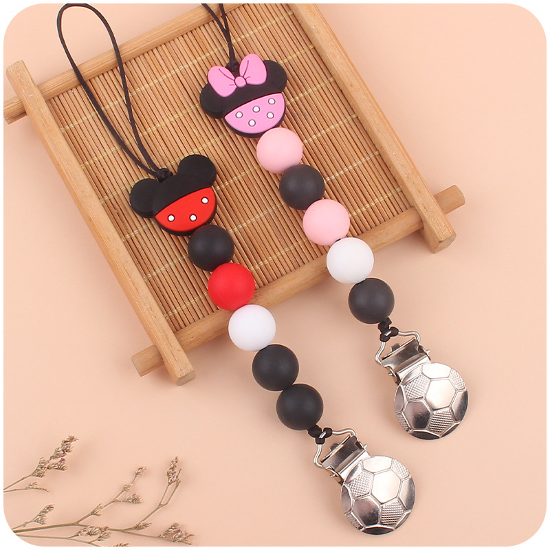 Suministros para bebés forma de fútbol clip de hierro bebé creativo de dibujos animados animal chupete cadena mordedura molar cadena anti-caída