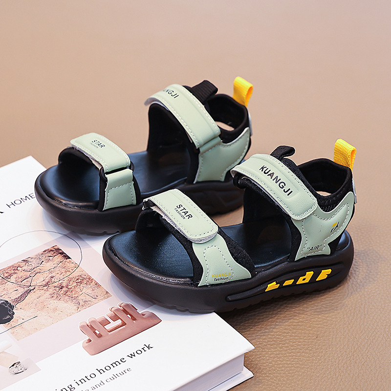 Niños huecos zapatos de playa de dedo abierto 2026 verano nuevo estilo de moda infantil sandalias versátiles sandalias de niños mayores