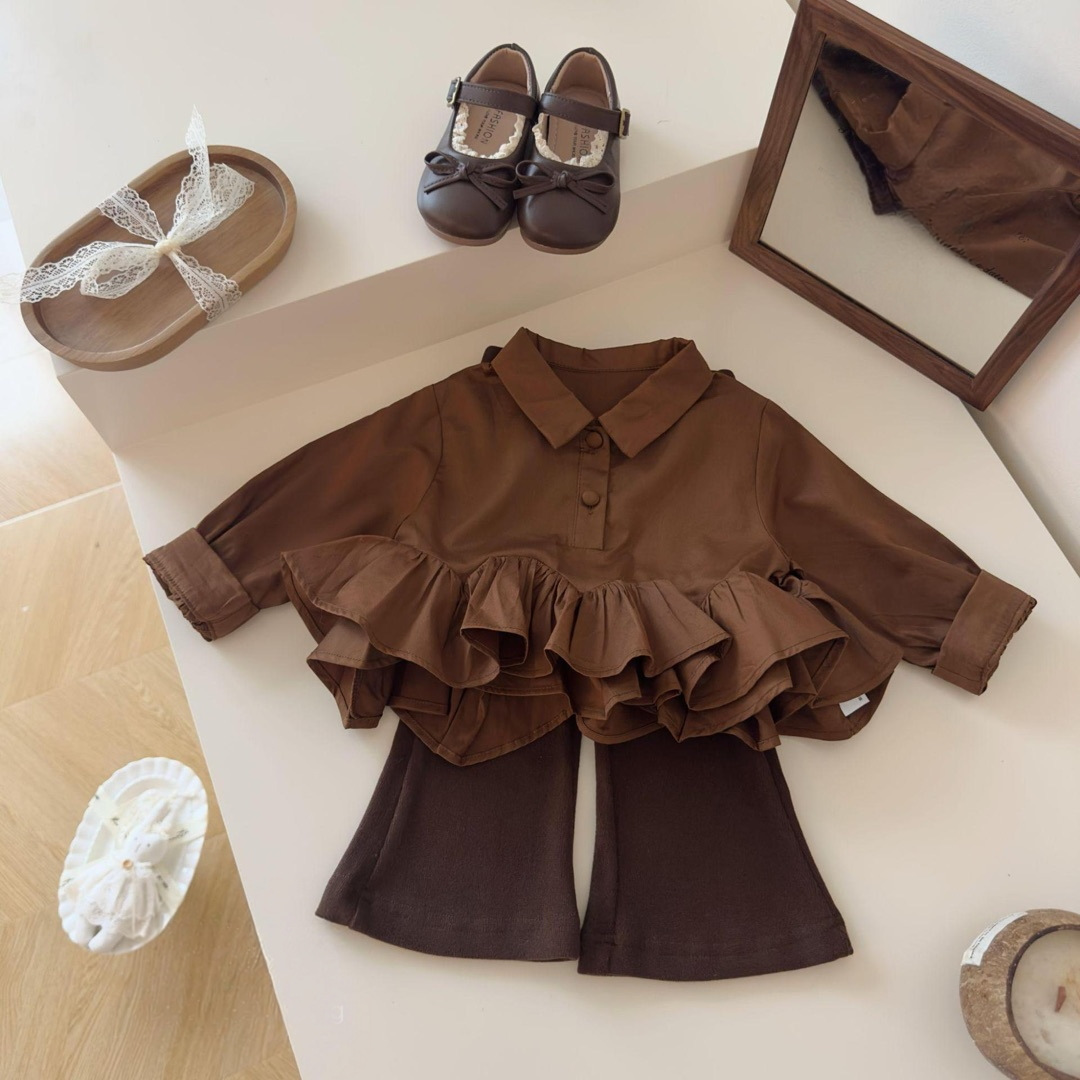 2026 girls' spring and autumn new collection: a two-piece set featuring a long-sleeved shirt with a collar and ruffled hem, and slightly flared pants, in a retro style, suitable for cross-border sales
