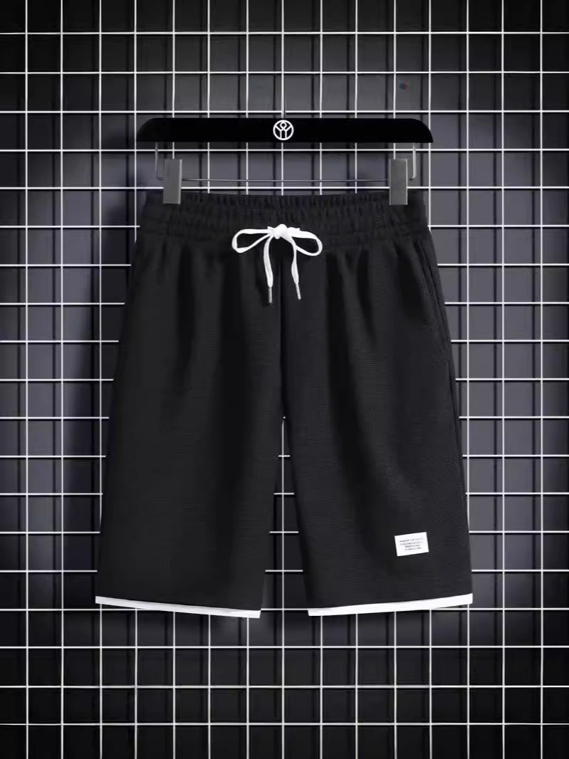 Camisa menos ropa Waffle pantalones de cinco puntos para hombres verano nuevo estilo estilo Hong Kong pantalones cortos de dos piezas falsos de color recto suelto