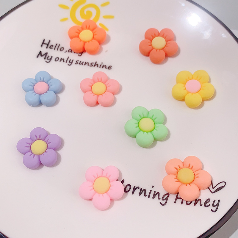 Accesorios de resina de cinco pétalos de color directo transfronterizo DIY pegamento de crema caja de teléfono móvil adornamiento de pelo agujero material de hebilla de zapatos