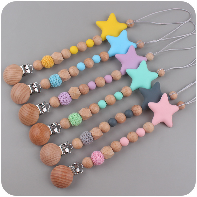 Bebé suministros de dibujos animados de silicona estrella mordedor calmante bebé chupete cadena silicona mordedura molar anti-gota cadena