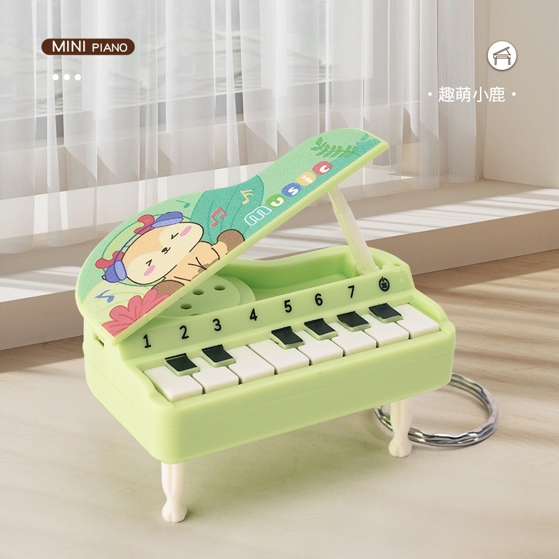 Transfronterizo portátil mini plegable piano de escritorio llavero colgante de simulación de teclas luminosas regalos musicales creativos