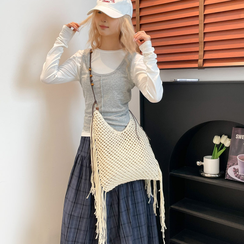 Bolso de vacaciones junto al mar 2025 verano nuevo estilo bolso de hombro tejido con flecos bolso de mensajero de gran capacidad mujer