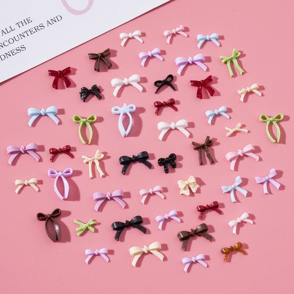 Small three dimensional bow tie with bow