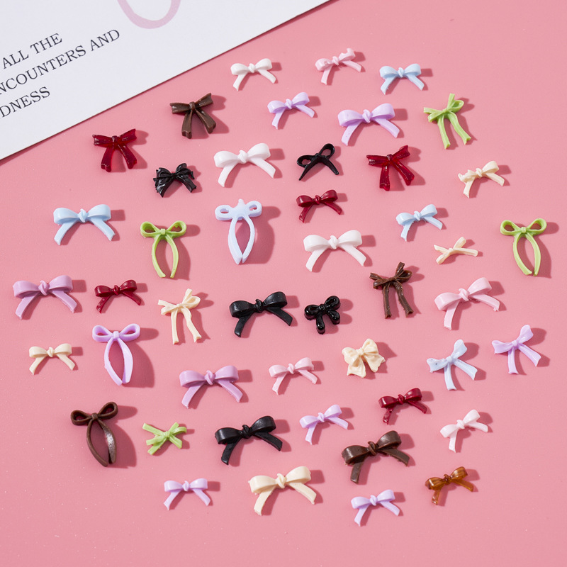 Small three dimensional bow tie with bow