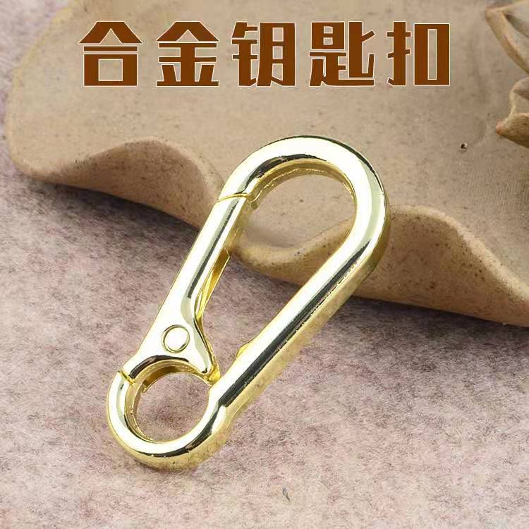 Primavera clave colgante metal coche clave cadena hombres y mujeres de cintura hebilla personalizada creativa pequeño regalo tienda departamental regalo