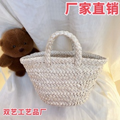 春夏の新型シンプルなトウモロコシの皮の小さいかごのDIYのハンドバッグのかわいいミニの編み物のカバンのショッピングバッグの草の編みのカバン