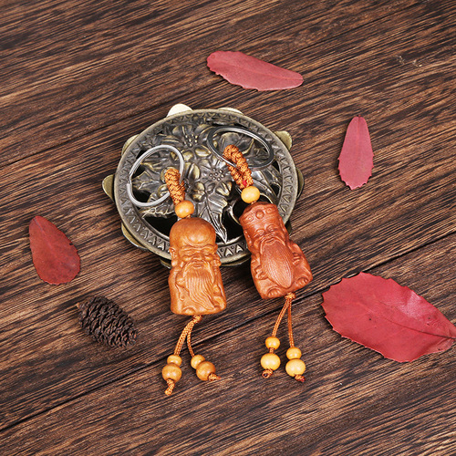 Wood carving wooden keychain wholesale wooden car pendant jewelry peach wood Guanyin Buddha attraction key pendant dropshipping