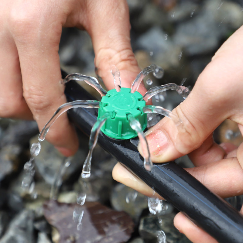 Nuevo agujero verde de ocho agujeros más anillo tórico compensación de presión goteo verde caudal ajustable goteo equipo de riego sin impuestos