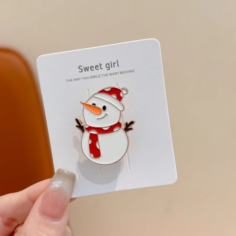 Broche de aleación de sentido avanzado japonés nueva insignia de personalidad de moda femenina de dibujos animados bolsa de Navidad accesorios de metal al por mayor