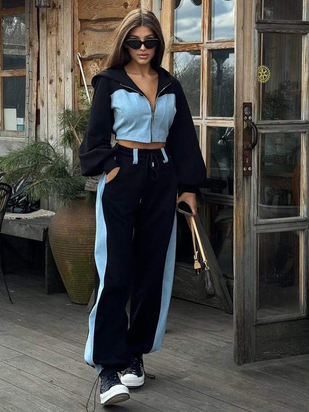 D9727 venta caliente suéter de moda casual de mujer europea y americana costura de mezclilla con capucha top pantalones de dos piezas