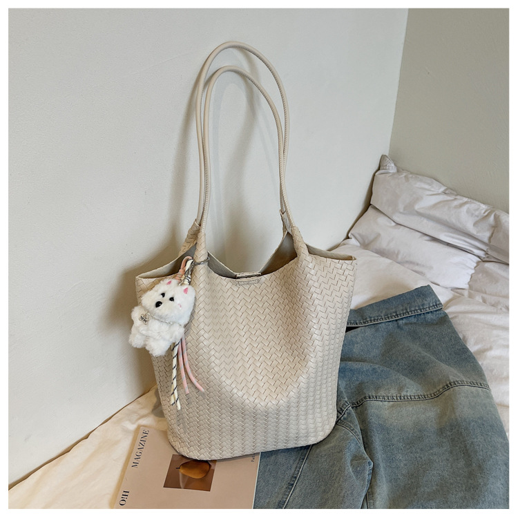 Bolsa coreana de gran capacidad para mujeres 2026 verano nuevo estilo de moda trenzado bolso de hombro axilar de viaje bolsa de ocio