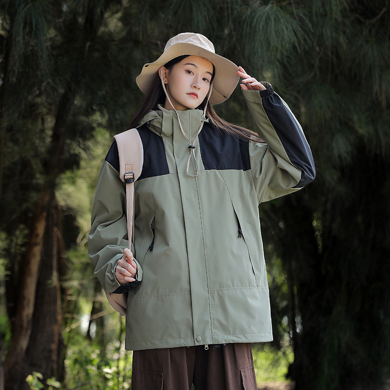 Chaqueta de invierno al aire libre para hombres y mujeres tres en uno de dos piezas de lana engrosada chaqueta de alpinismo a prueba de viento al por mayor en vivo