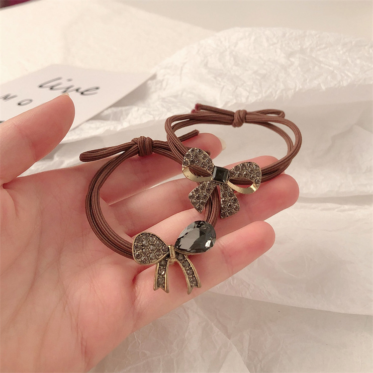 Retro aleación de diamante arco toque de cabello cuerdas de goma anillo de cabello de alta elasticidad y duradera toque de cabello