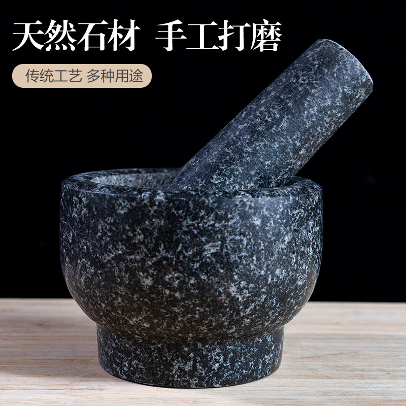 un cilindro de piedra negra tipo molino de piedra de grasa