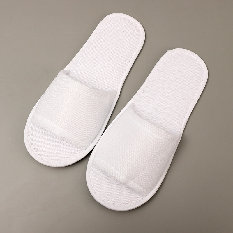 オールシーズン対応のホテル用の本物の美しい布製スリッパ、B&B用の厚みのある滑り止め底、卸売用の使い捨てスリッパ|undefined
